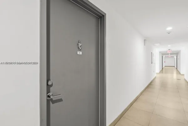 a view of a hallway with closet