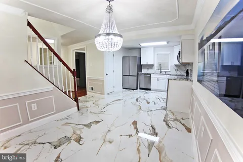 a view of entryway with wooden floor