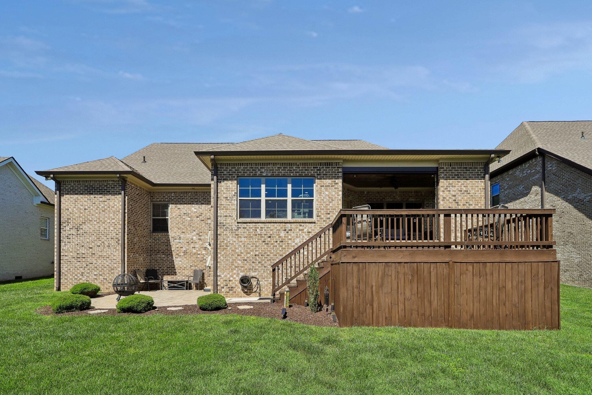 1006 Alpaca Drive Spring Hill, TN 37174 - Photo 27 of 32 front view of a house with a yard