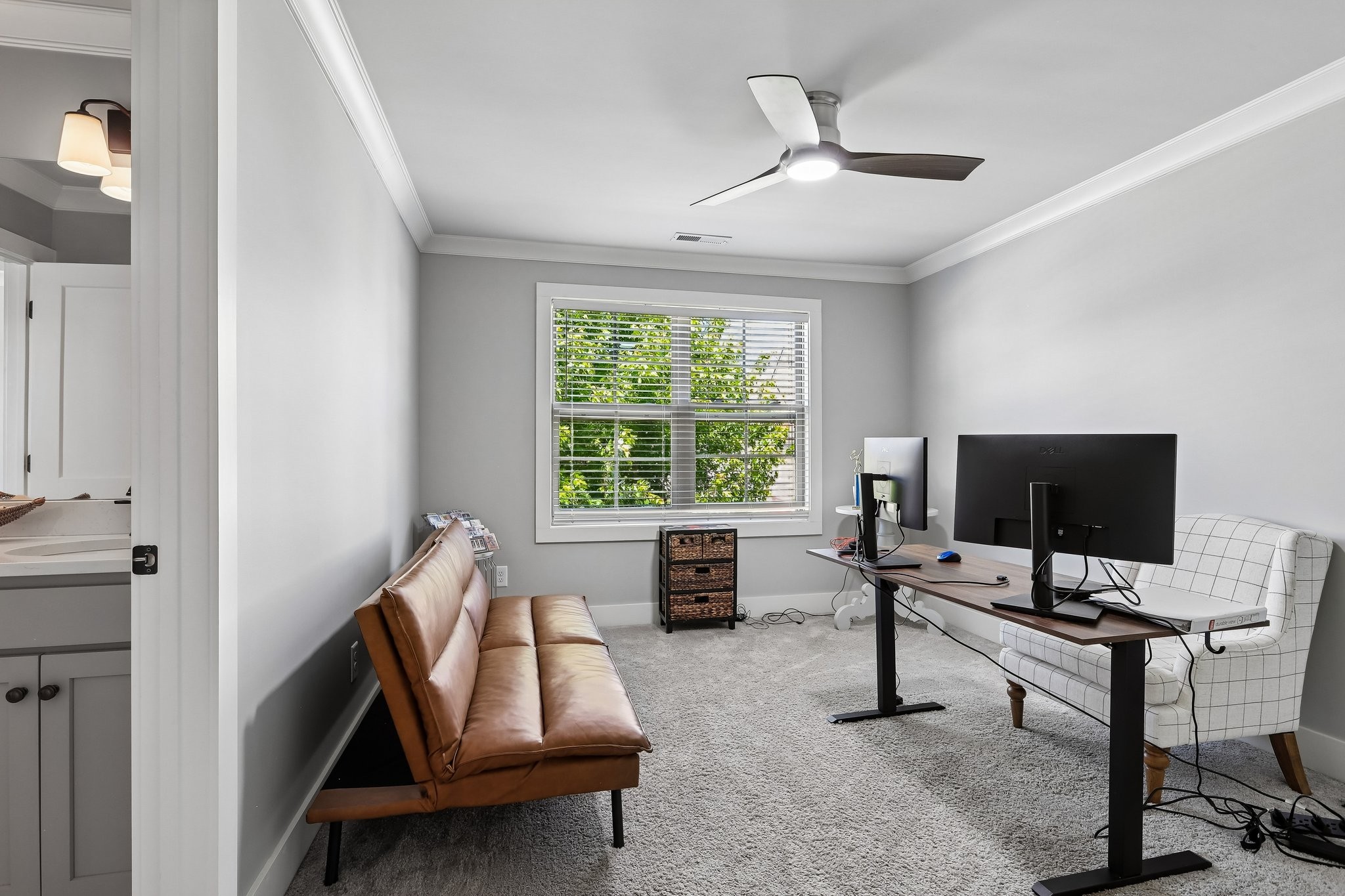 1006 Alpaca Drive Spring Hill, TN 37174 - Photo 28 of 32 a living room with furniture and a flat screen tv