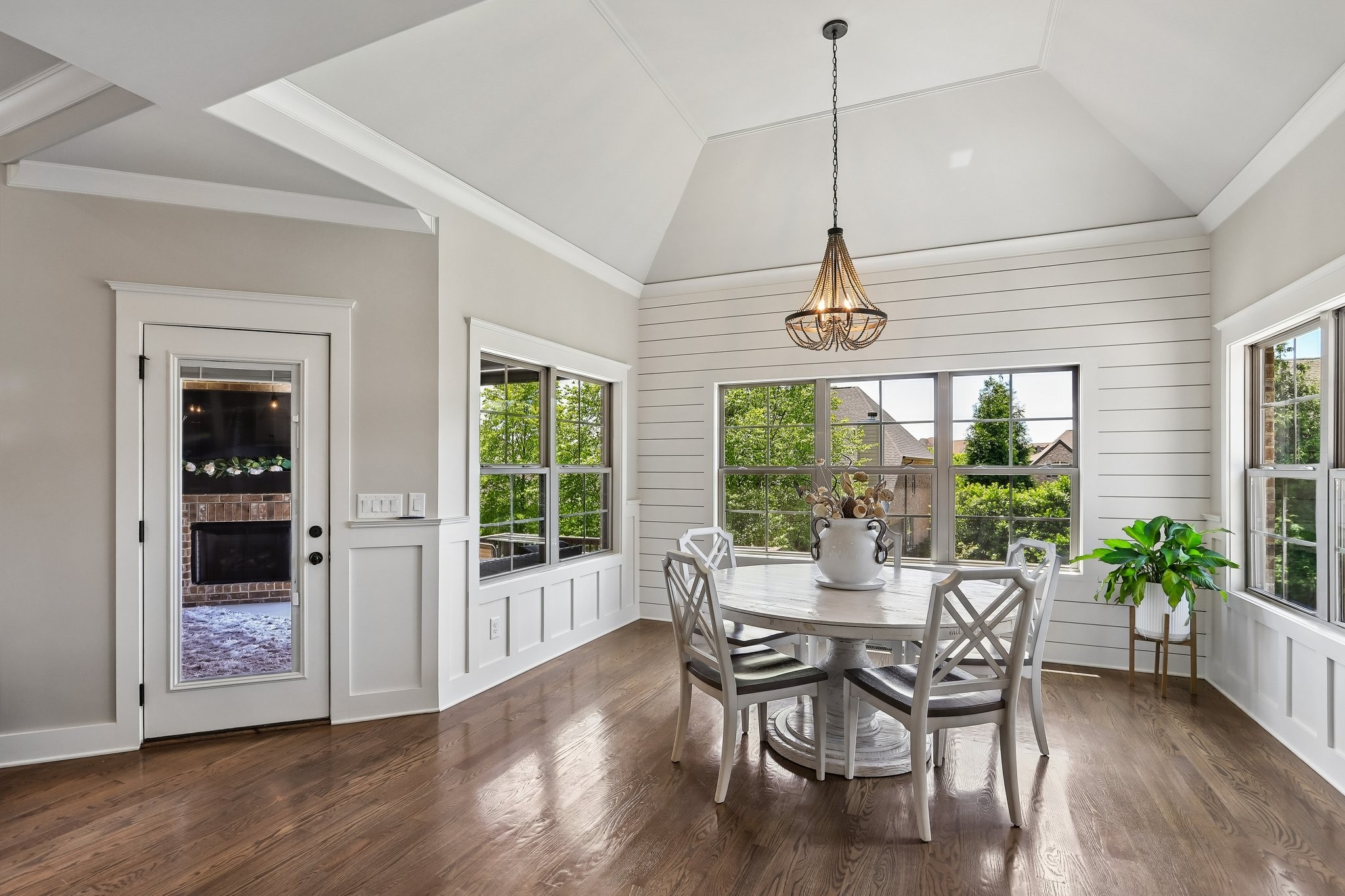 1006 Alpaca Drive Spring Hill, TN 37174 - Photo 7 of 32 a dining room with furniture window wooden floor