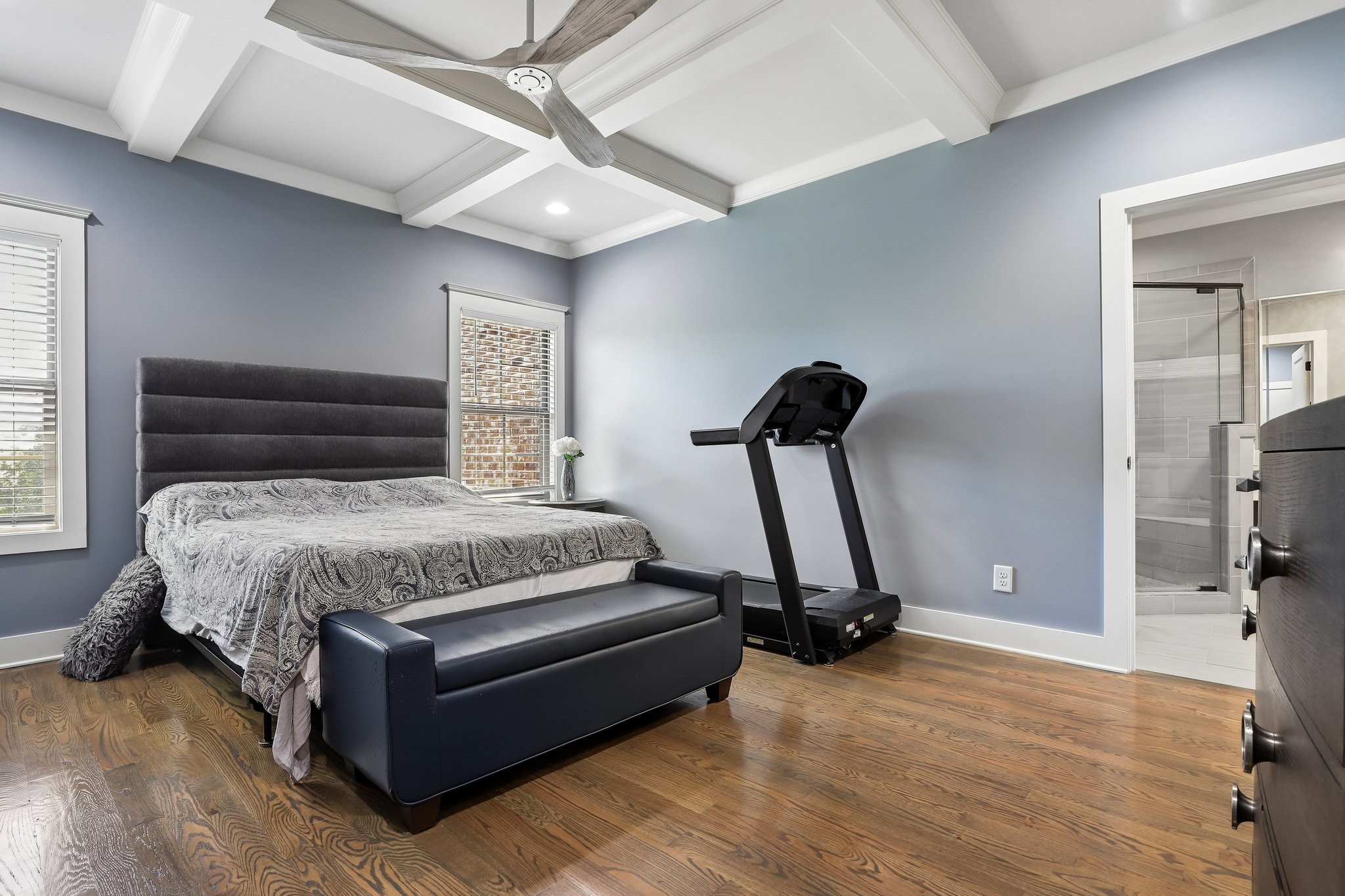 1006 Alpaca Drive Spring Hill, TN 37174 - Photo 10 of 32 a bedroom with a bed and a chandelier