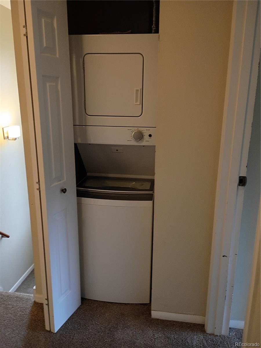 1625 West Elizabeth Street, Unit A1 Fort Collins, CO 80521 - Photo 17 of 27 a utility room with dryer and washer
