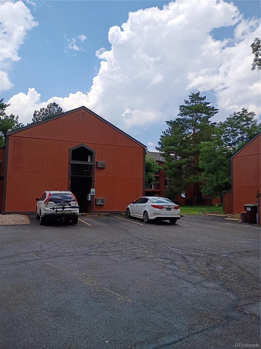 1625 West Elizabeth Street, Unit A1 Fort Collins, CO 80521 - Photo 21 of 27 a car parked in front of a house