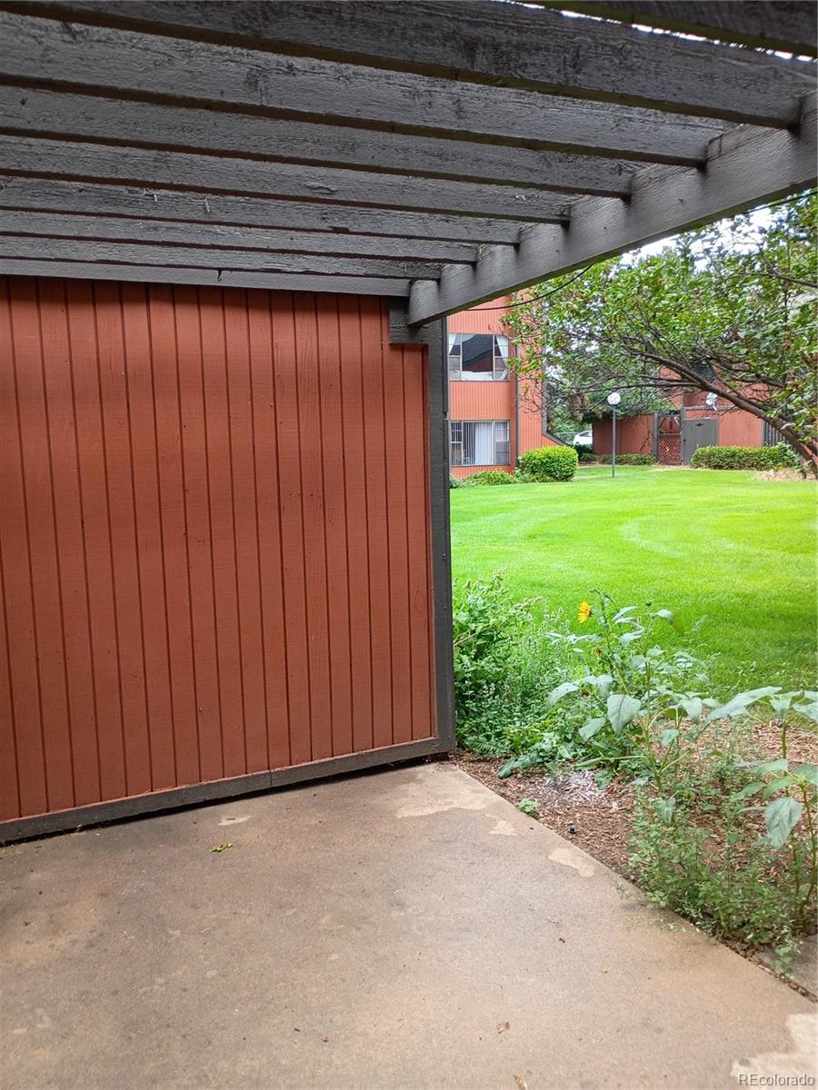 1625 West Elizabeth Street, Unit A1 Fort Collins, CO 80521 - Photo 22 of 27 a view of a backyard with plants