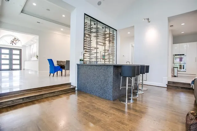 a room with gym equipment and a large window