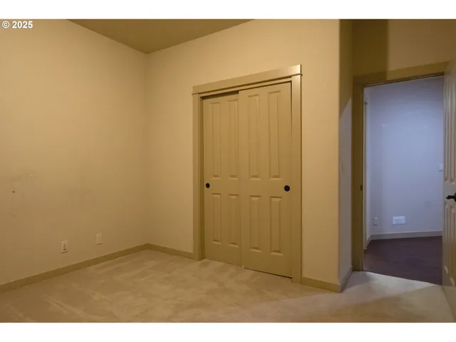 a bathroom with a granite countertop sink toilet a mirror and shower