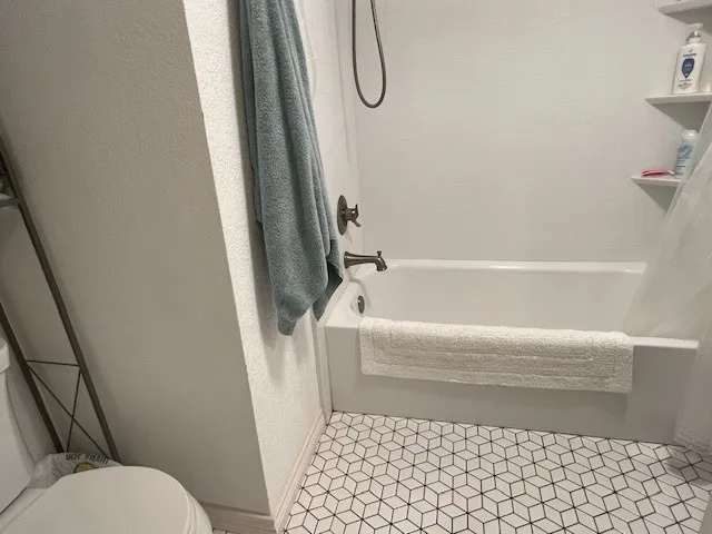 a view of a backyard with hardwood