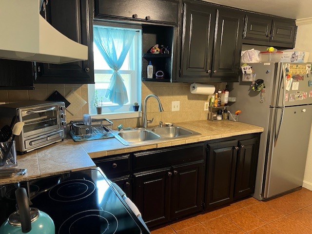 1505 Maple Street Georgetown, TX 78626 - Photo 7 of 20 a kitchen with a sink appliances and cabinets
