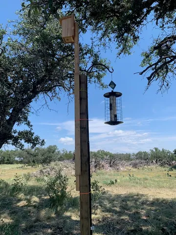 a view of a yard with an outdoor space