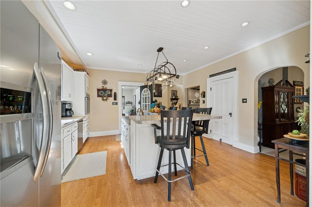 1200 Hahntown-Wendel Road Irwin, PA 15642 - Photo 15 of 49 a view of a dining room with furniture and wooden floor