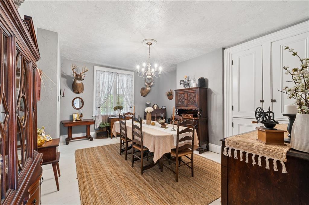 1200 Hahntown-Wendel Road Irwin, PA 15642 - Photo 20 of 49 a view of a dining room with furniture window and wooden floor