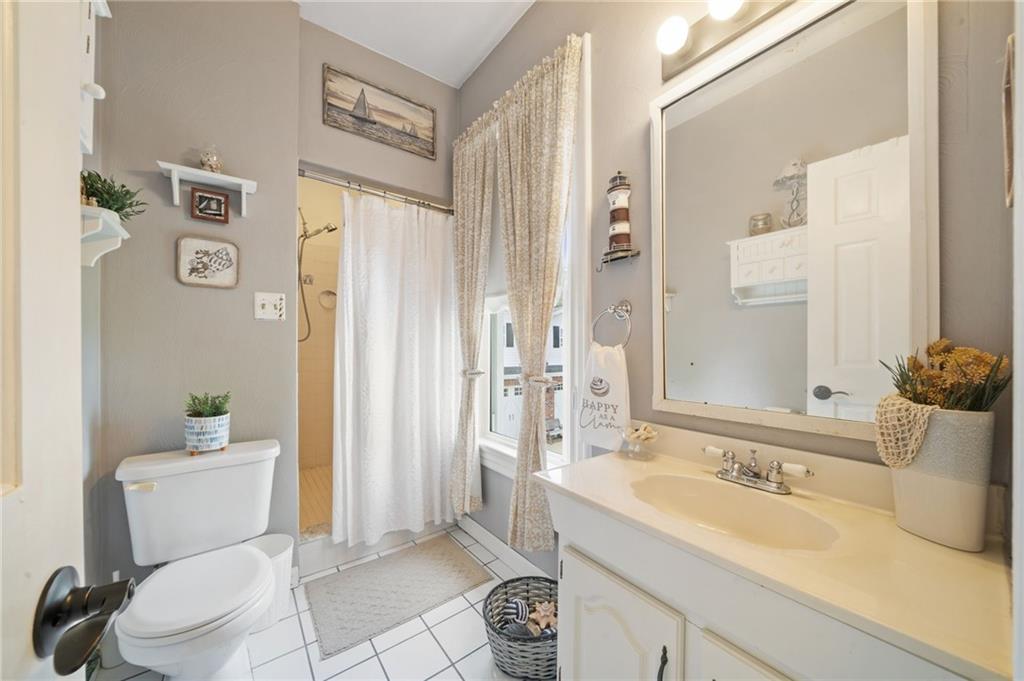 1200 Hahntown-Wendel Road Irwin, PA 15642 - Photo 33 of 49 a bathroom with a sink a toilet and shower