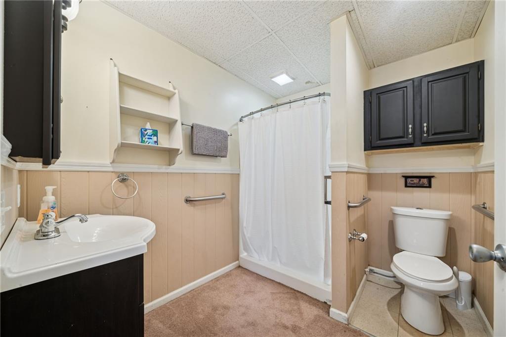 1200 Hahntown-Wendel Road Irwin, PA 15642 - Photo 36 of 49 a bathroom with a sink a toilet and shower