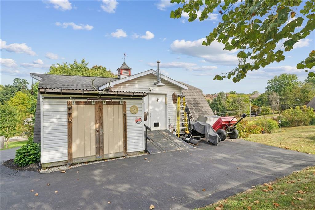 1200 Hahntown-Wendel Road Irwin, PA 15642 - Photo 40 of 49 a view of a house with a patio