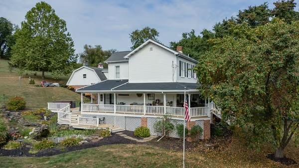 1200 Hahntown-Wendel Road Irwin, PA 15642 - Photo 43 of 49 a house with trees in the background