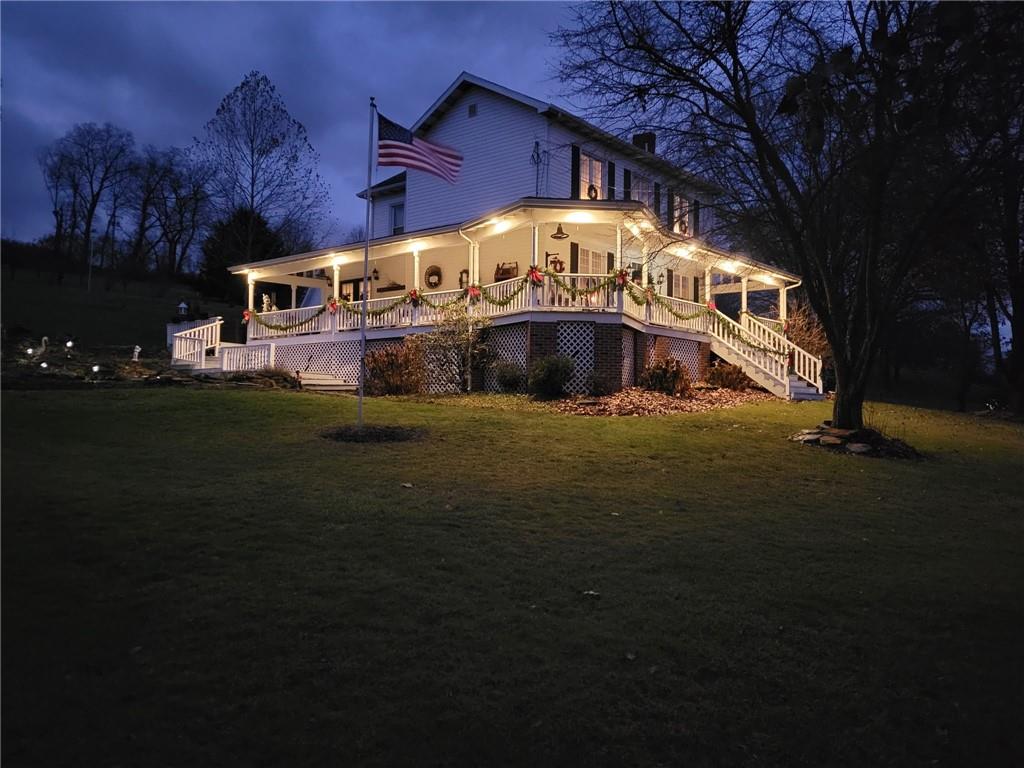 1200 Hahntown-Wendel Road Irwin, PA 15642 - Photo 5 of 49 a front view of a house with a yard
