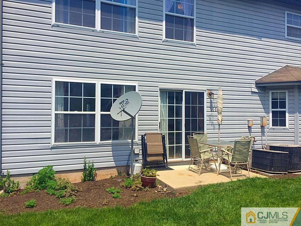 384 Draco Road Piscataway, NJ 08854 - Photo 15 of 19 a view of a house with backyard and a porch
