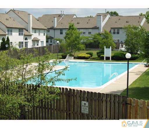 384 Draco Road Piscataway, NJ 08854 - Photo 18 of 19 a view of a house with a swimming pool