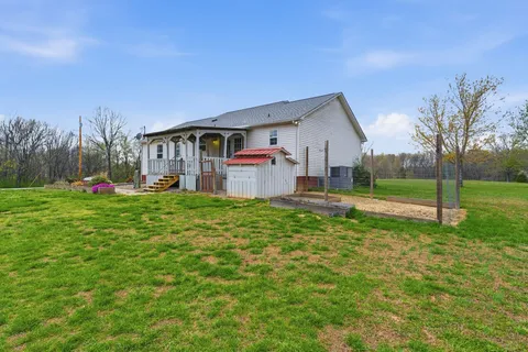 a house view with a garden space
