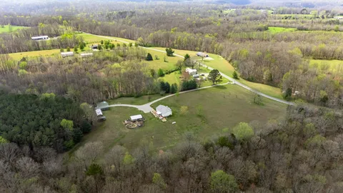 an aerial view of houses with outdoor space