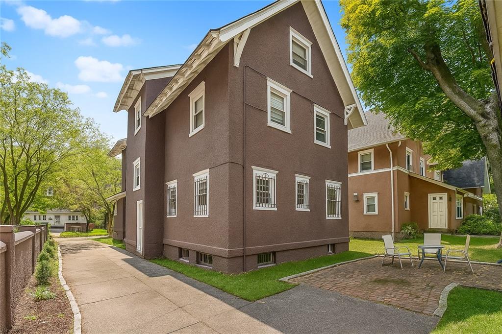 1917 Glenwood Road Brooklyn, NY 11230 - Photo 6 of 36 a front view of a house with a yard