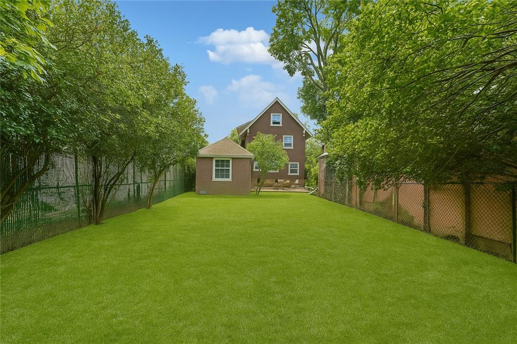 1917 Glenwood Road Brooklyn, NY 11230 - Photo 7 of 36 a front view of house with yard and green space