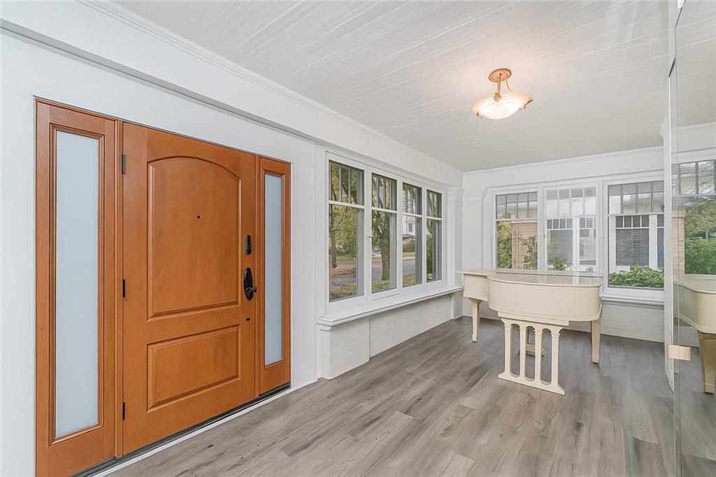 1917 Glenwood Road Brooklyn, NY 11230 - Photo 9 of 36 a living room with furniture wooden floor and a window