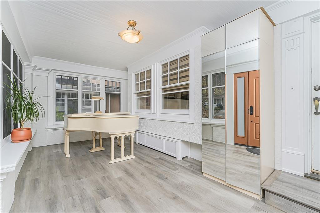 1917 Glenwood Road Brooklyn, NY 11230 - Photo 10 of 36 a view of a house with wooden deck and furniture