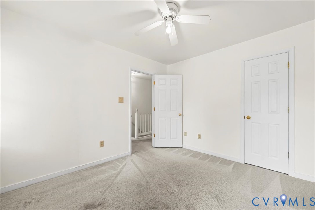 2924 Warfield Ridge Terrace Chester, VA 23831 - Photo 28 of 38 Carpeted room featuring white painted walls and a