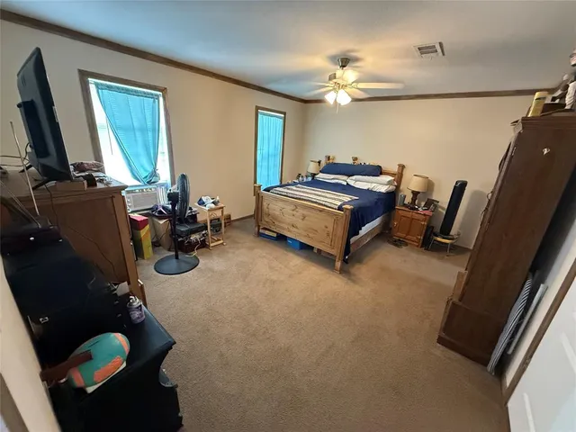 a bathroom with washing machine and a sink