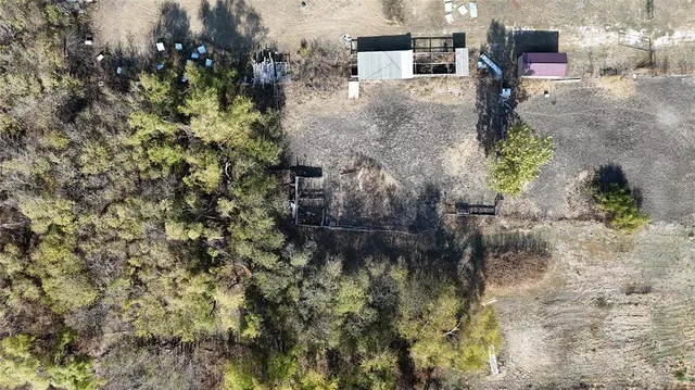 a view of balcony with wooden floor