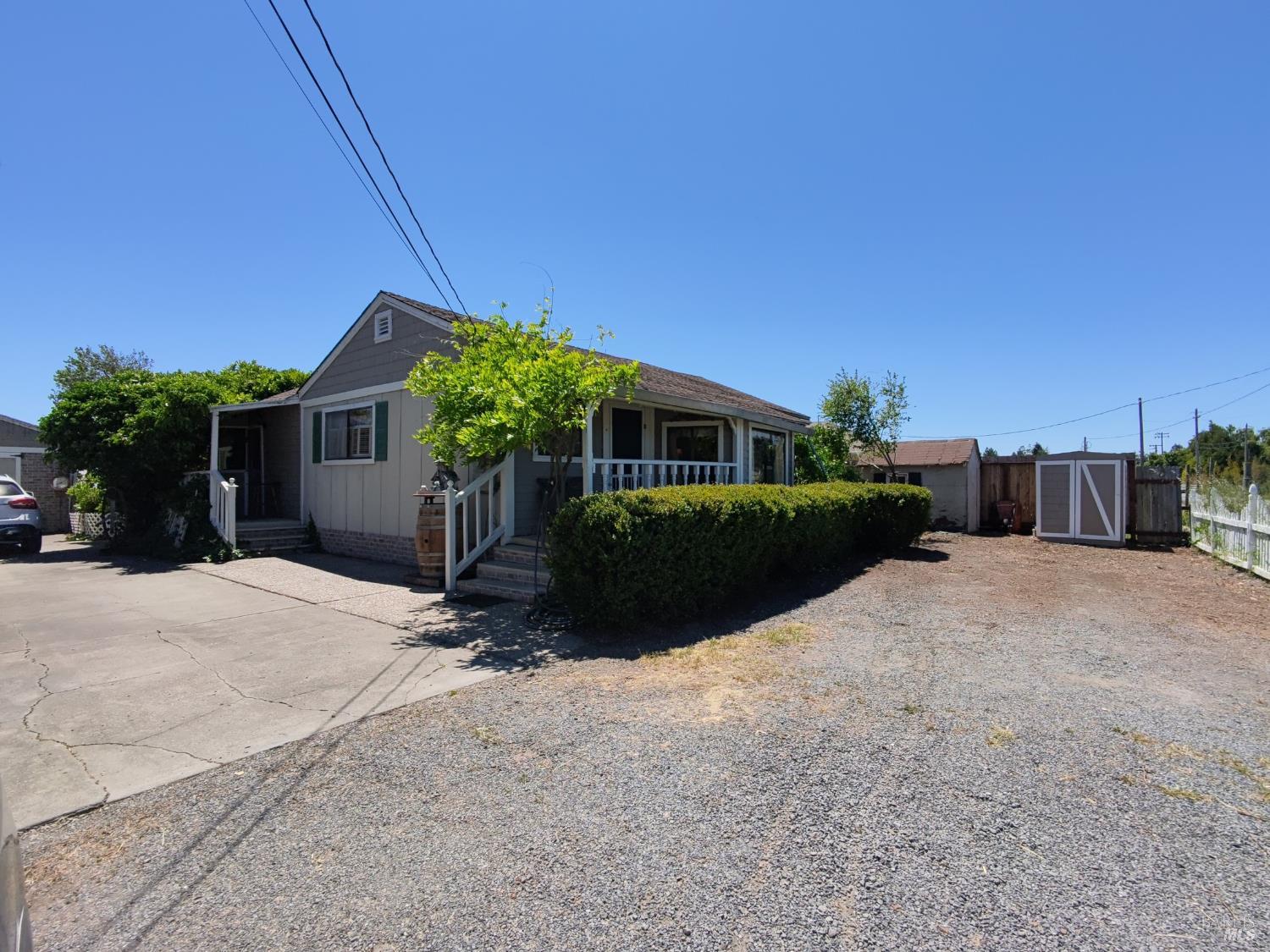 148 Millbrae Avenue Santa Rosa, CA 95407 - Photo 11 of 29 a view of a house with a yard and potted plants