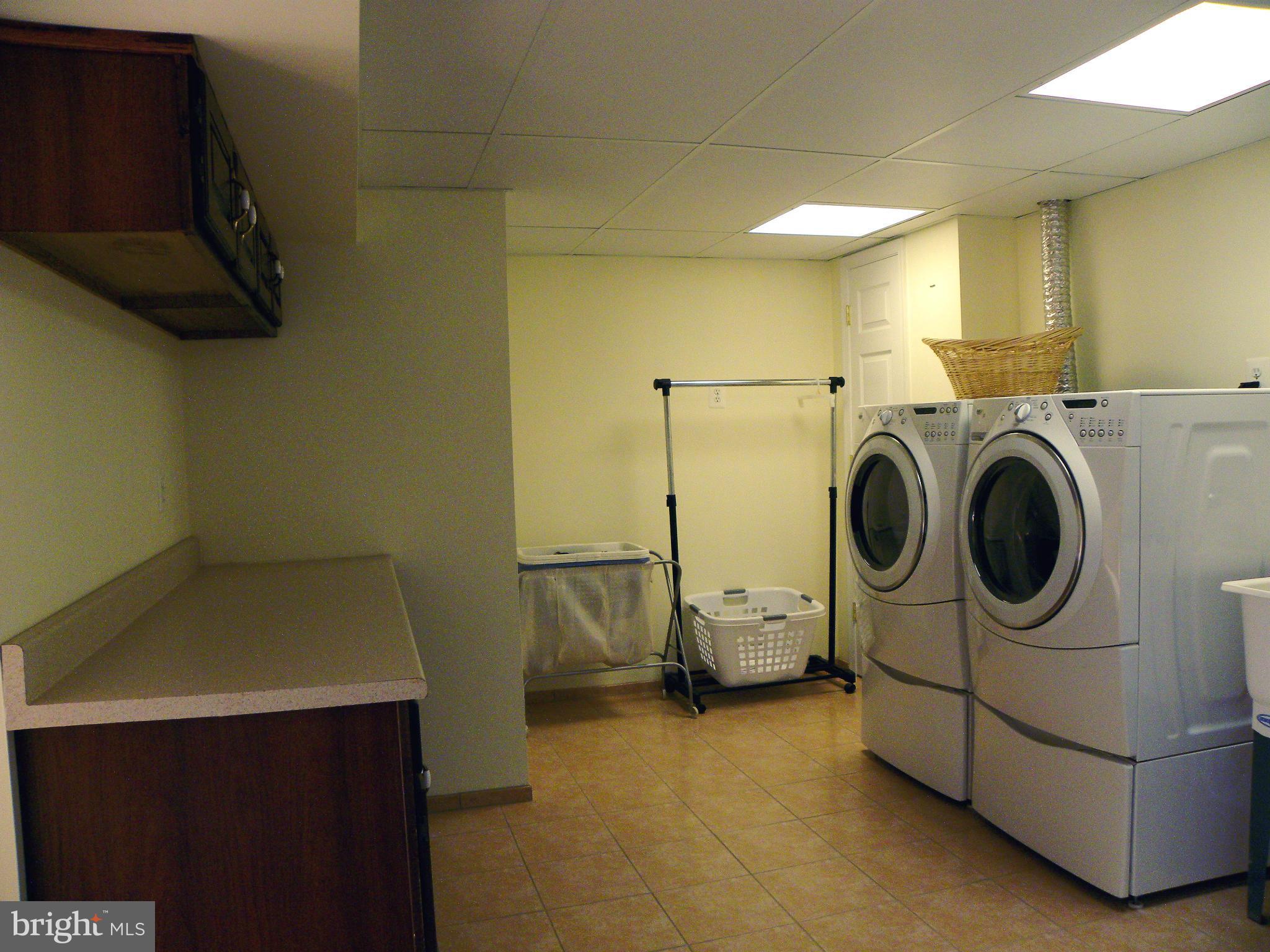5385 Green Bridge Road Dayton, MD 21036 - Photo 22 of 29 Spacious laundry room with folding station/storage
