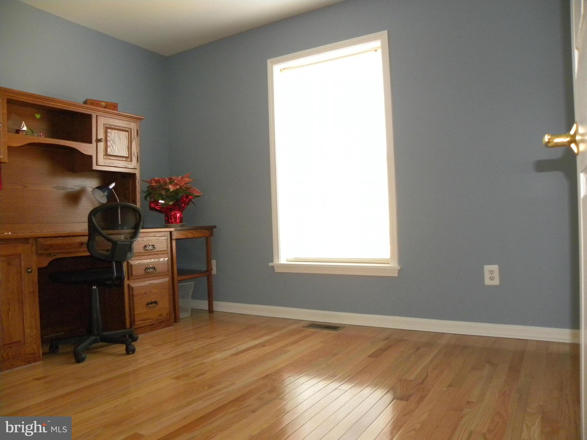 5385 Green Bridge Road Dayton, MD 21036 - Photo 10 of 29 Main level bedroom with oak floors