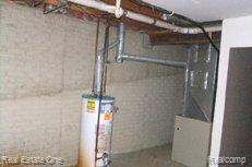 6618 Edgewood Drive Brighton, MI 48116 - Photo 24 of 25 Hot Water Tank