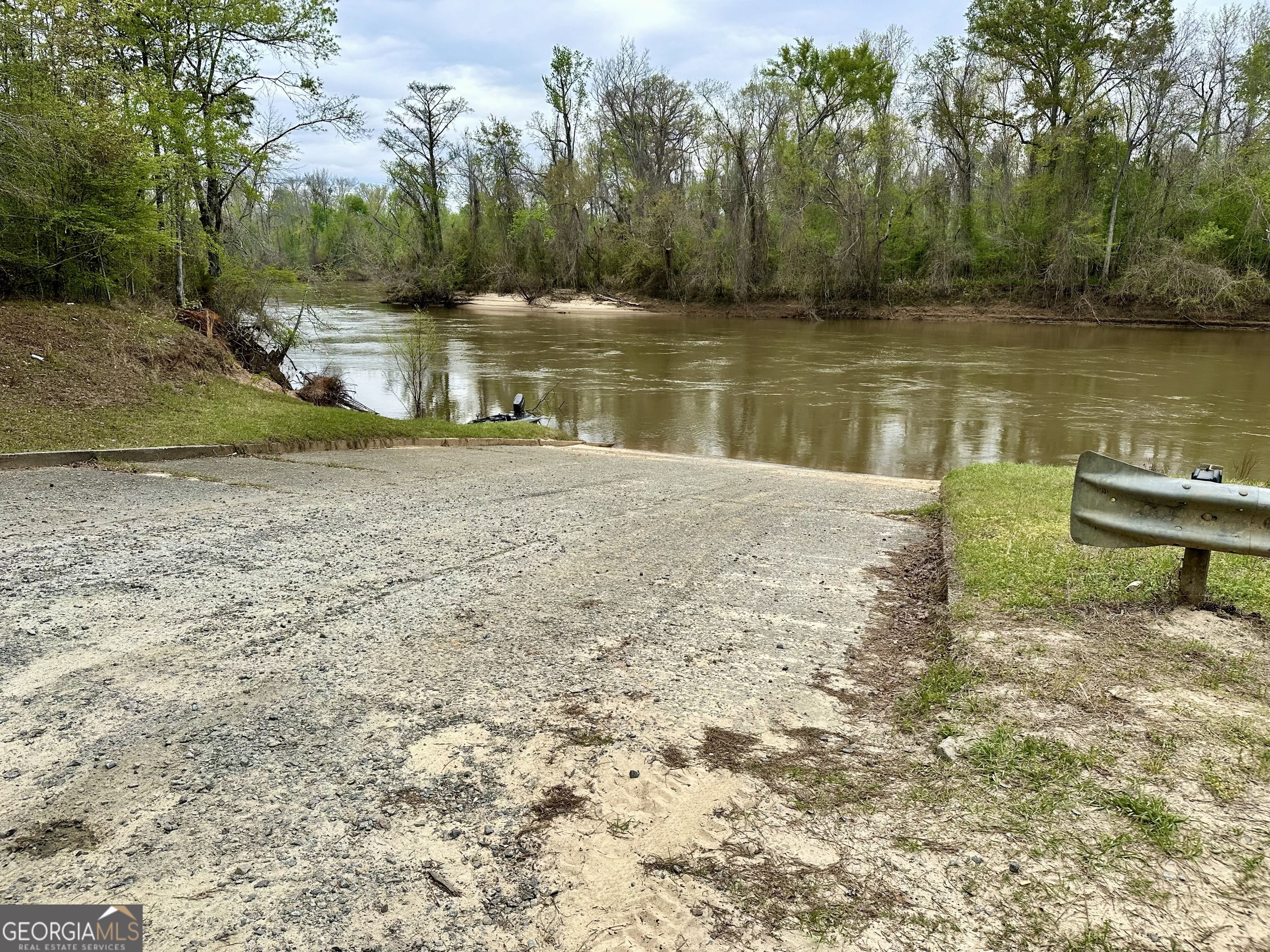 1976 Rock Springs Road Dublin, GA 31021 - Photo 13 of 13 a view of a lake with a yard and trees