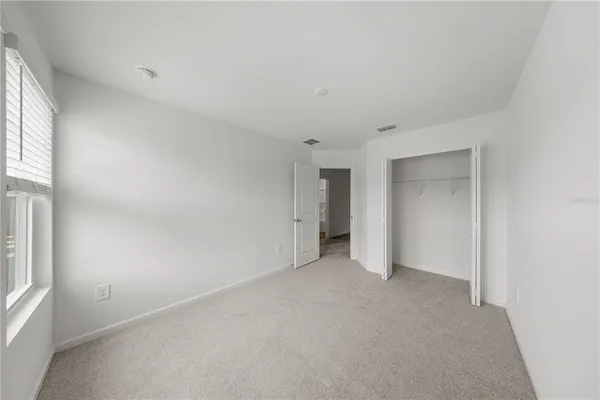 an empty room with a natural light