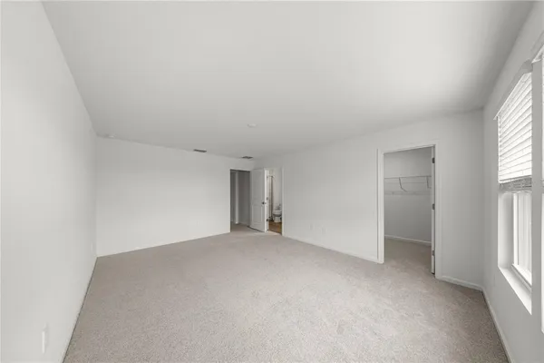 an empty room with windows