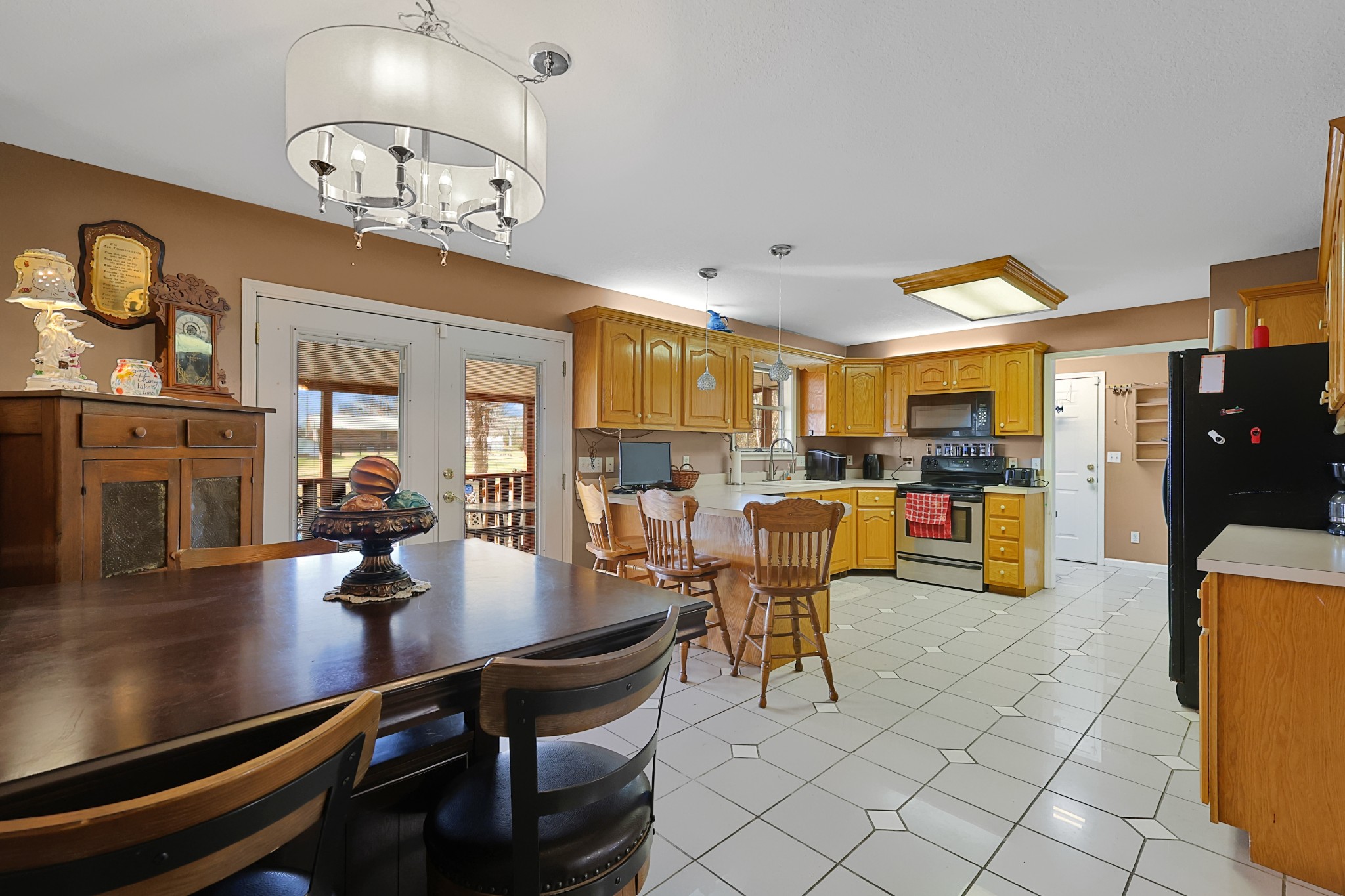 126 4th Avenue North Baxter, TN 38544 - Photo 11 of 33 a dining room with wooden floor and breakfast area