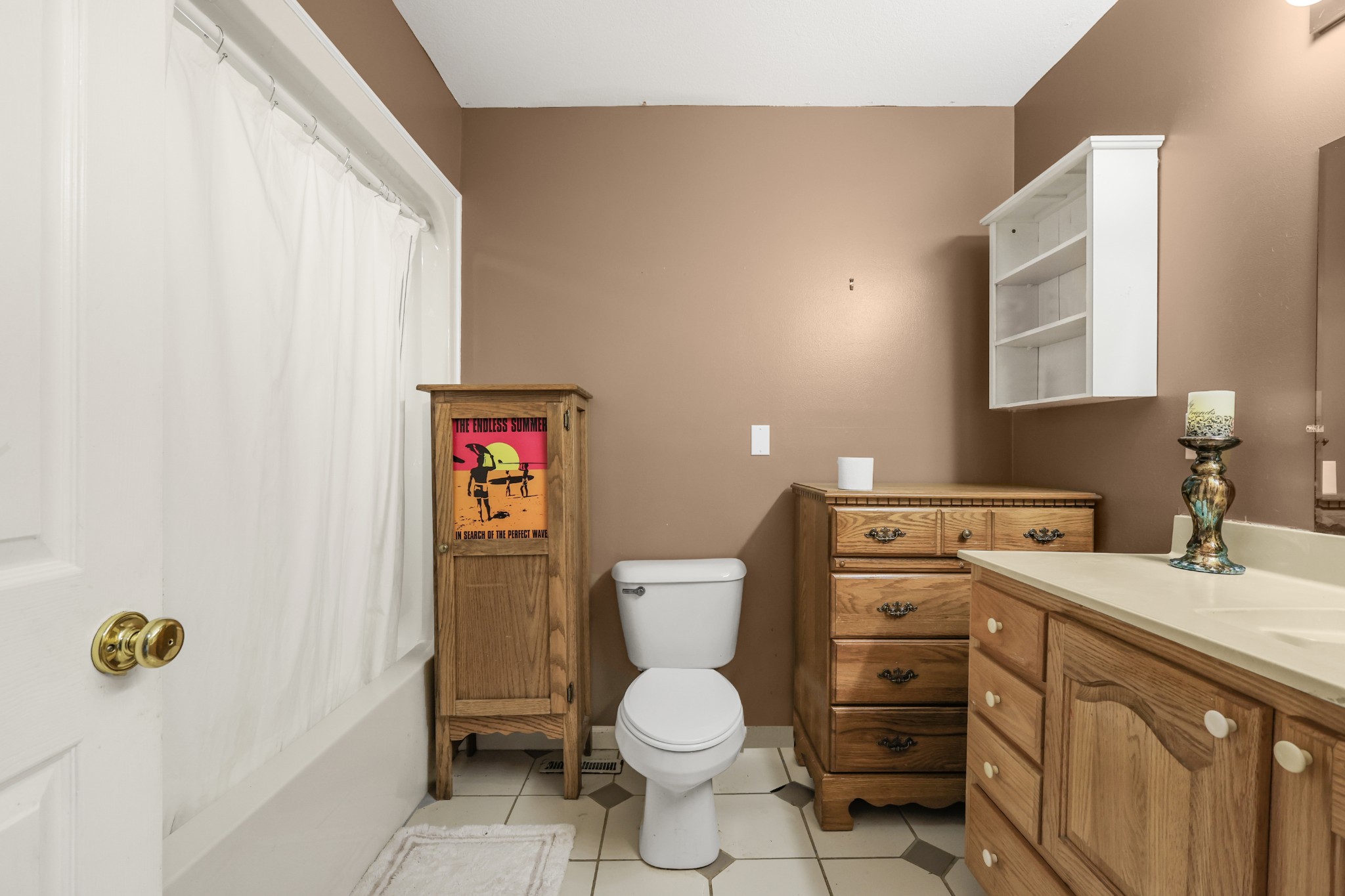 126 4th Avenue North Baxter, TN 38544 - Photo 18 of 33 a bathroom with a toilet sink vanity and mirror