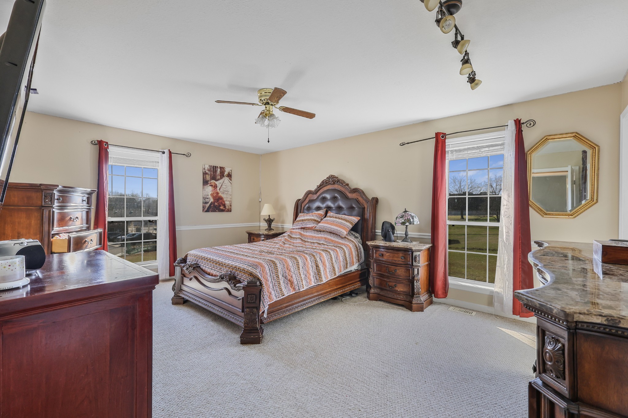126 4th Avenue North Baxter, TN 38544 - Photo 23 of 33 a spacious bedroom with a bed and a couch