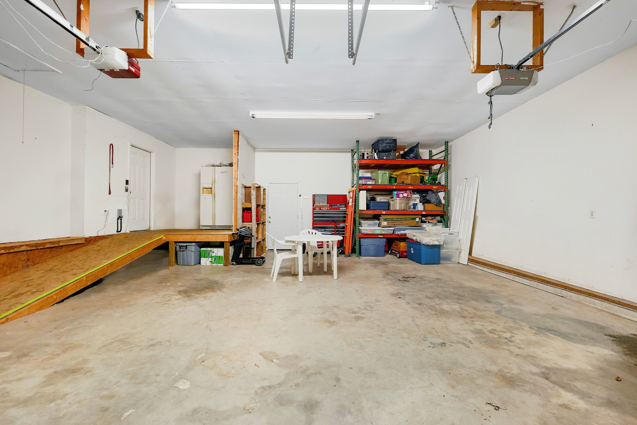 126 4th Avenue North Baxter, TN 38544 - Photo 27 of 33 a view of a storage area with racks on the wall
