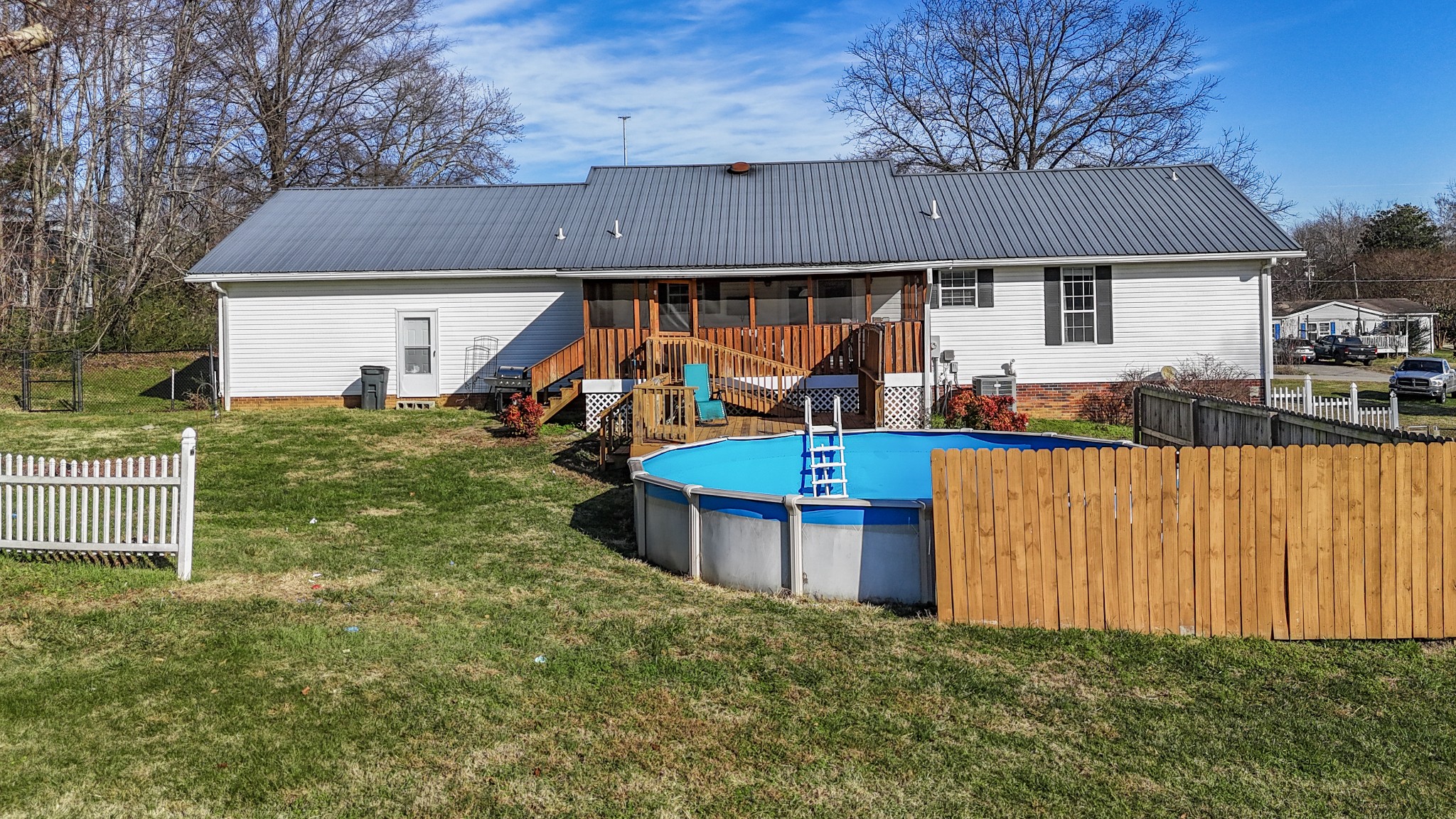 126 4th Avenue North Baxter, TN 38544 - Photo 4 of 33 a view of a house with backyard and a slide