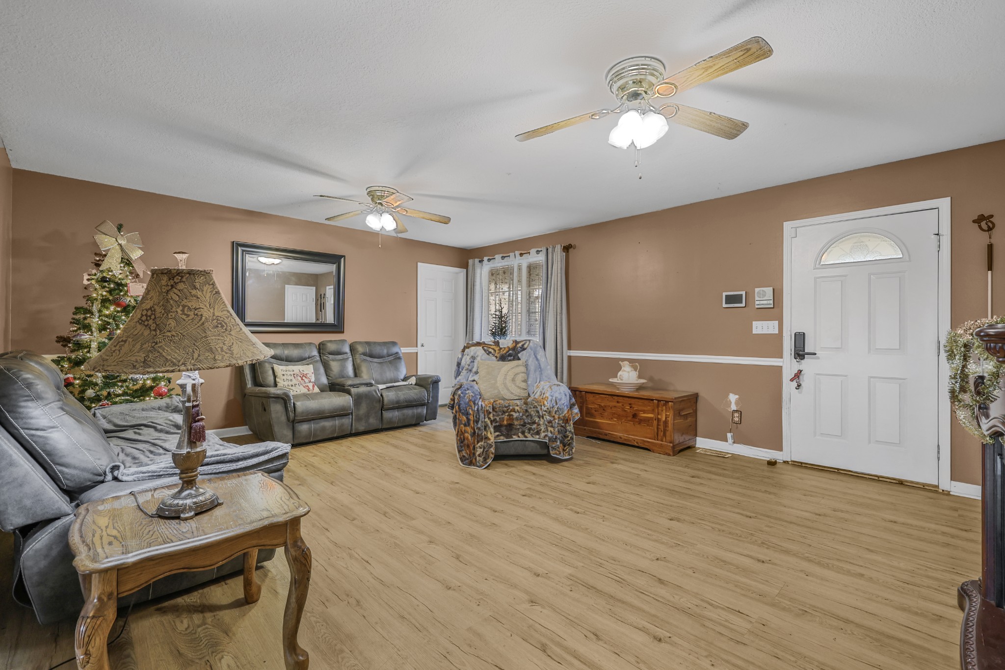 126 4th Avenue North Baxter, TN 38544 - Photo 8 of 33 a living room with furniture and a wooden floor