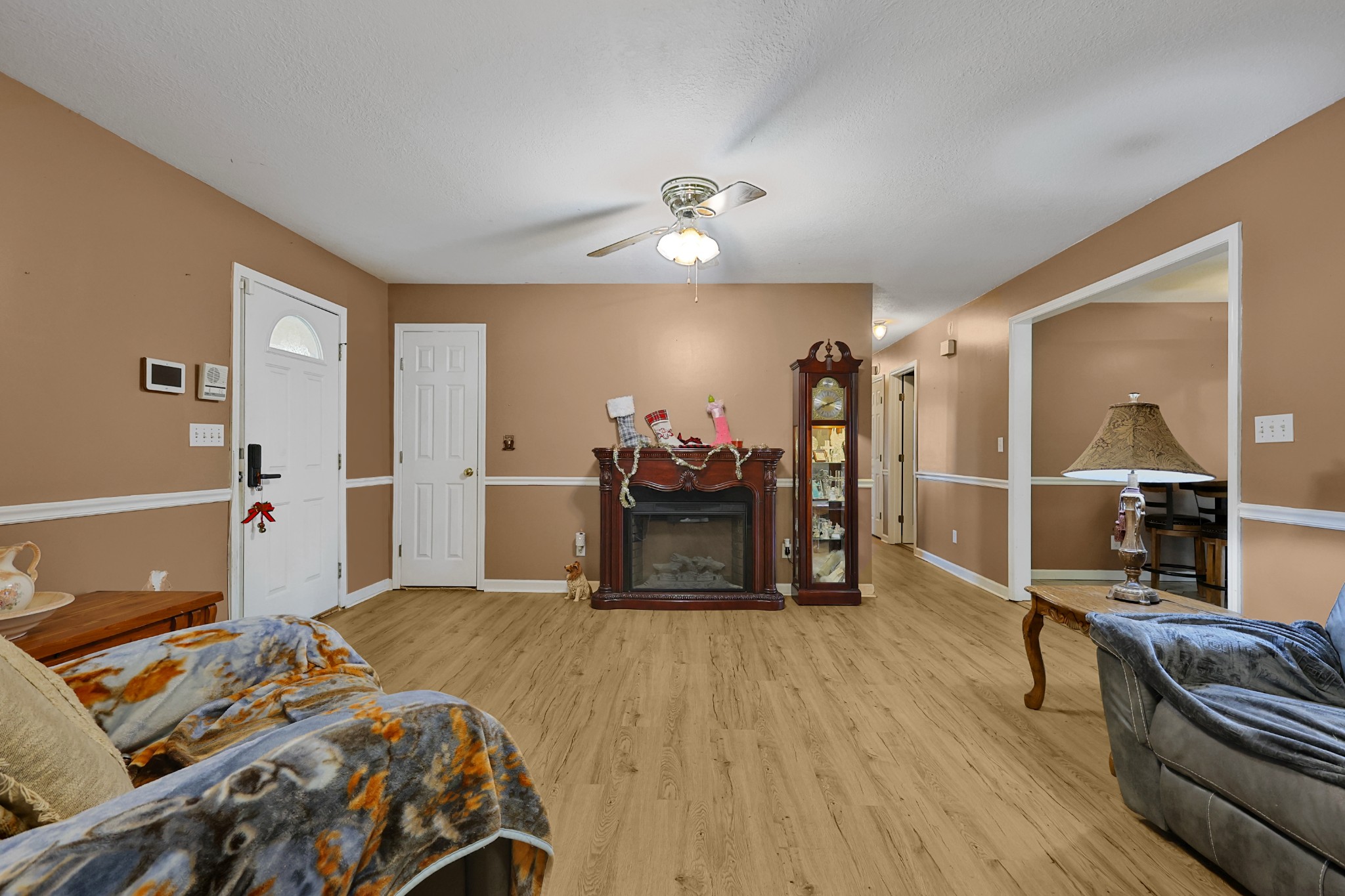 126 4th Avenue North Baxter, TN 38544 - Photo 9 of 33 a bedroom with a bed and a chandelier