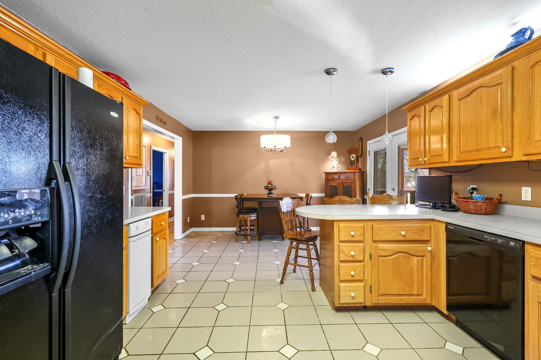 126 4th Avenue North Baxter, TN 38544 - Photo 10 of 33 a kitchen with stainless steel appliances granite countertop a refrigerator and a stove
