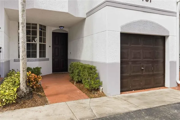 a view of a entryway door front of house