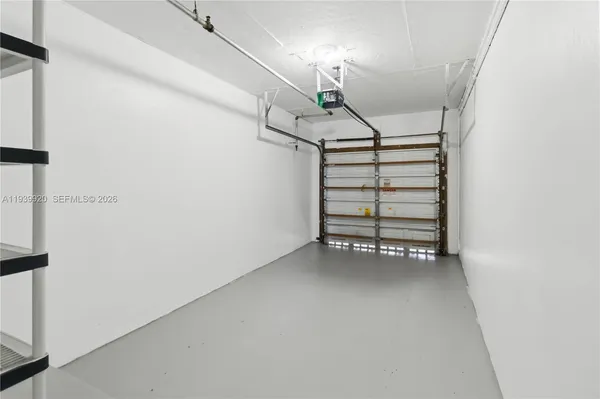 a view of hallway with a front door