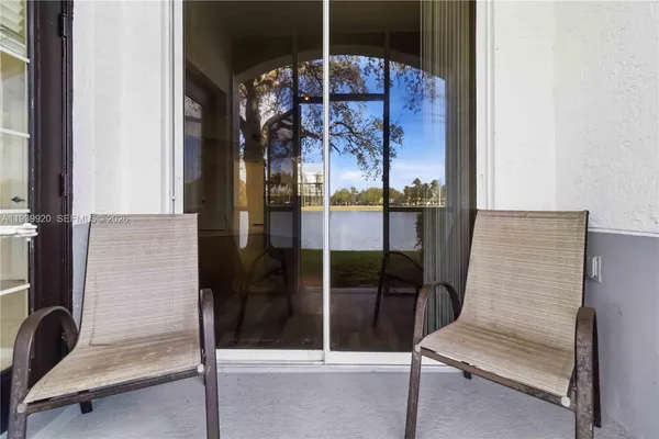 a view of a yard with a lake